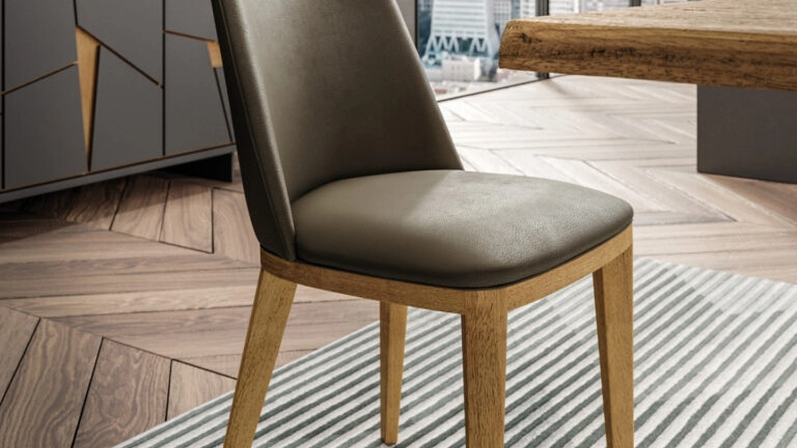 Sedia Nesty2 in pelle con gambe in legno di FGF Mobili